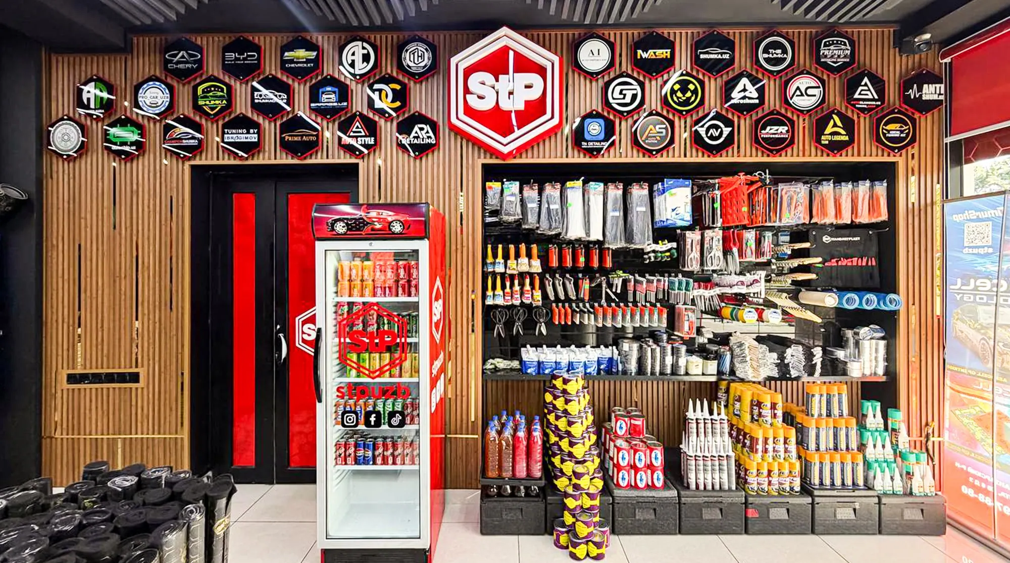 Accessories and detailing chemicals on the showroom shelving